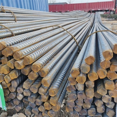 HRB335 HRB400 HRB500 BS460 ASTM A615 Gr 60 Ζεστό τυλιγμένο παραμορφωμένο ράβδος χάλυβα Σιδηροσίδηρο σκυρόδεμα προσαρμογή